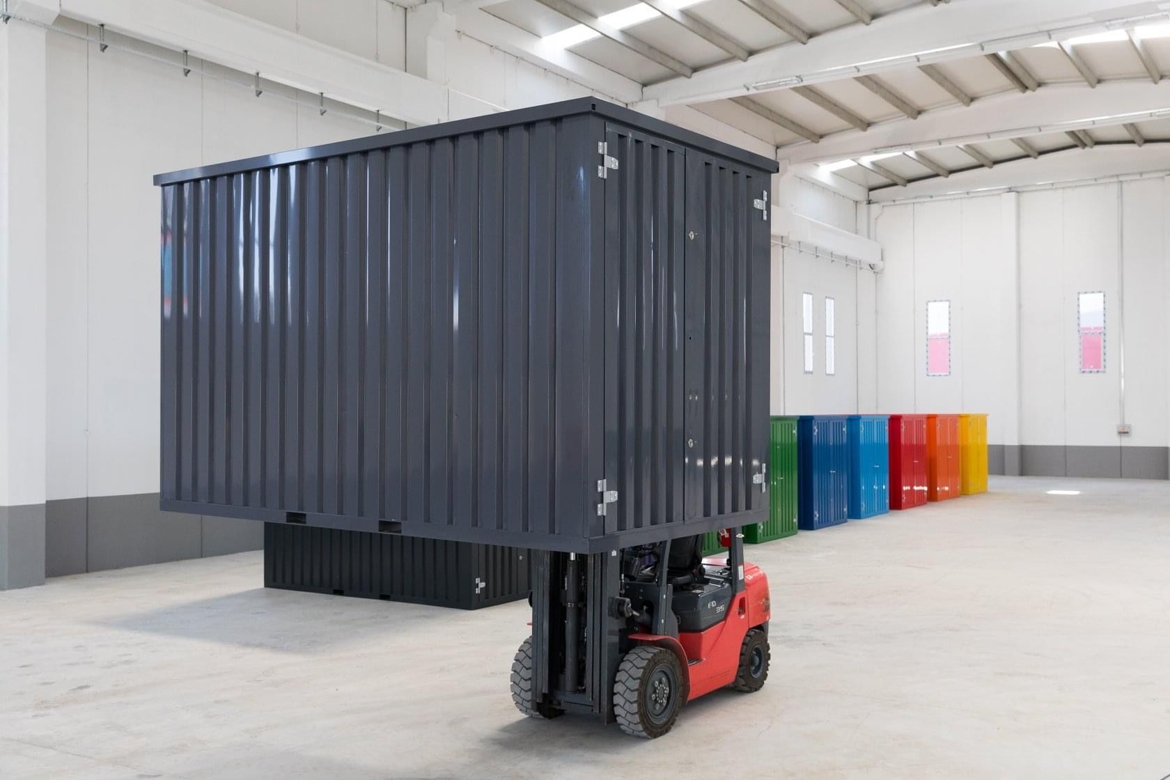 Man Putting the Box in the Container Truck - Lagrangeville, NY - RDM Move Managers