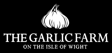 Logo for The Garlic Farm on the Isle of Wight with a white garlic bulb on a black background