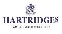 Hartridges logo with crest and tagline “Family Owned Since 1882” on a white background