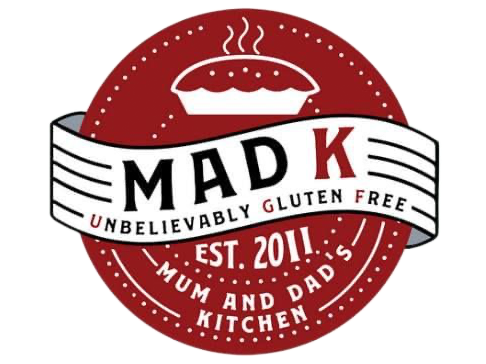 Red circular logo reading “MAD K” with “Unbelievably Gluten Free” and “Mum and Dad’s Kitchen” text.