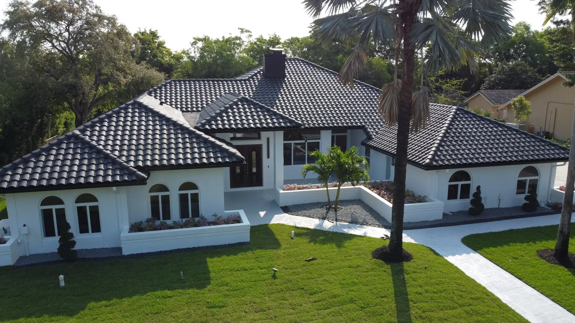 Dark tile roof installed on a Florida residence