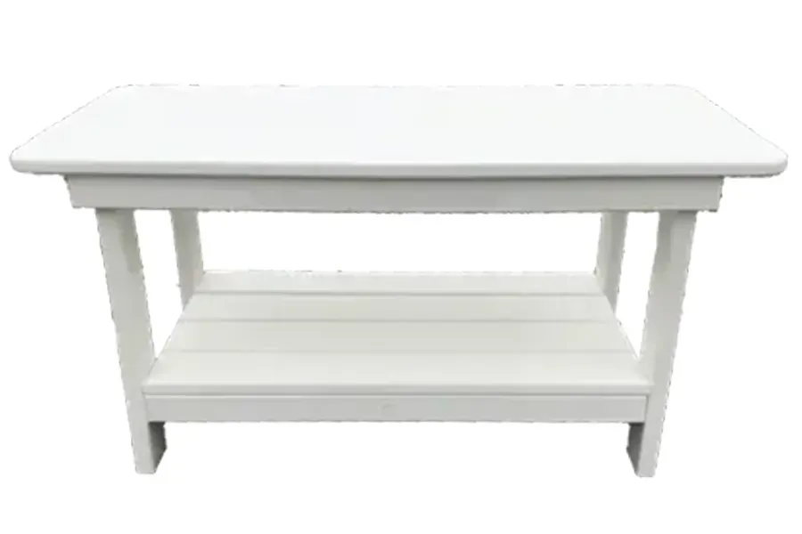 White wooden table with lower shelf on a plain white background