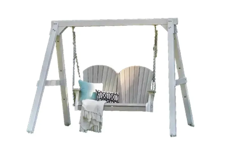 White wooden porch swing with aqua pillows and blanket on a stand