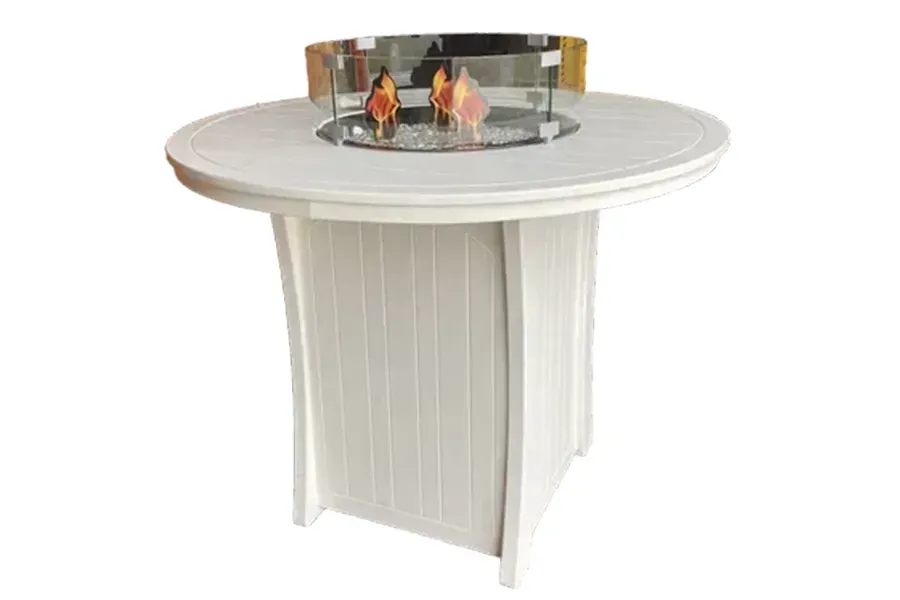 Round white fire pit table with a glass center and visible flames, isolated on a white background