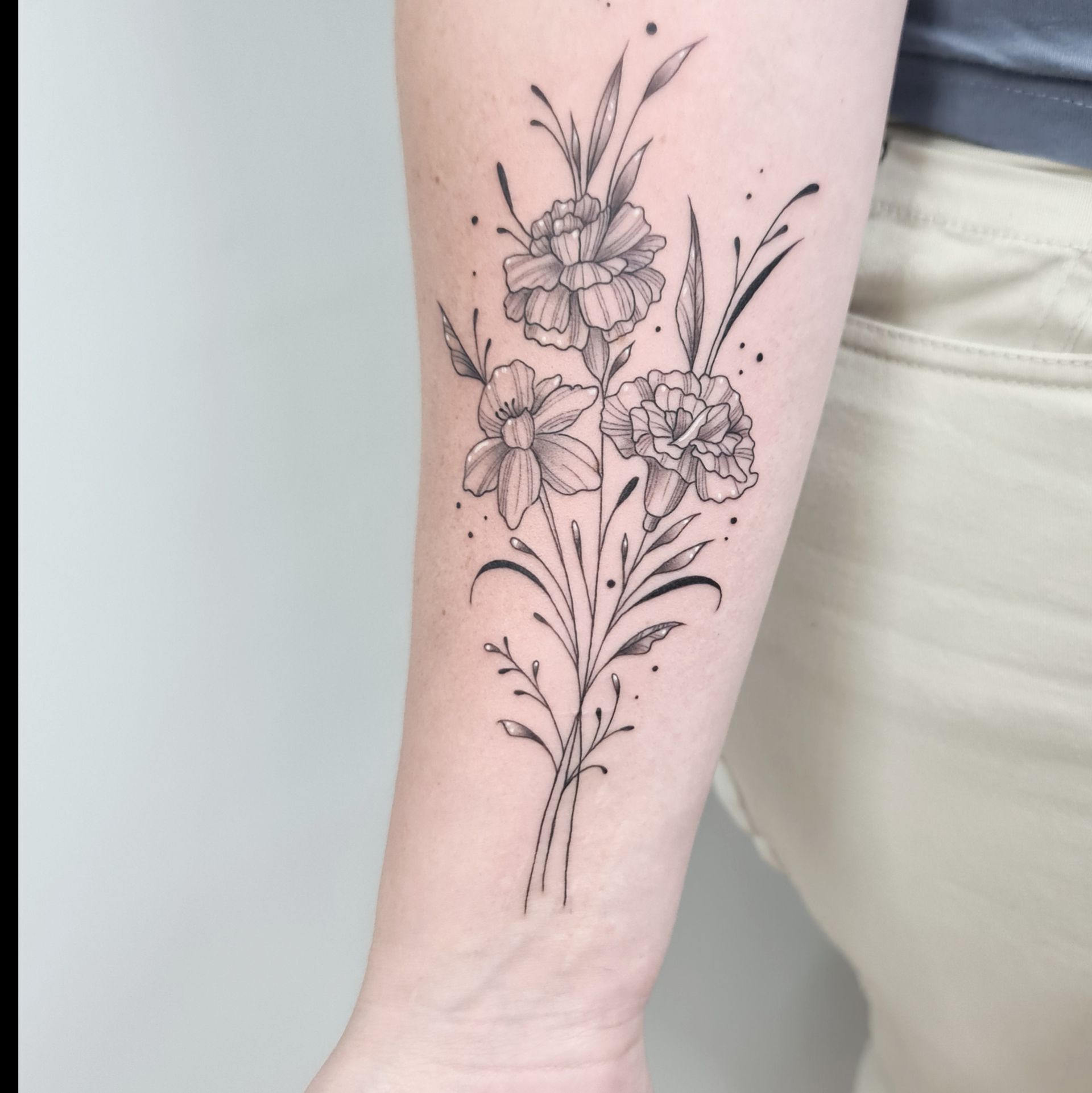 tattoo on right arm