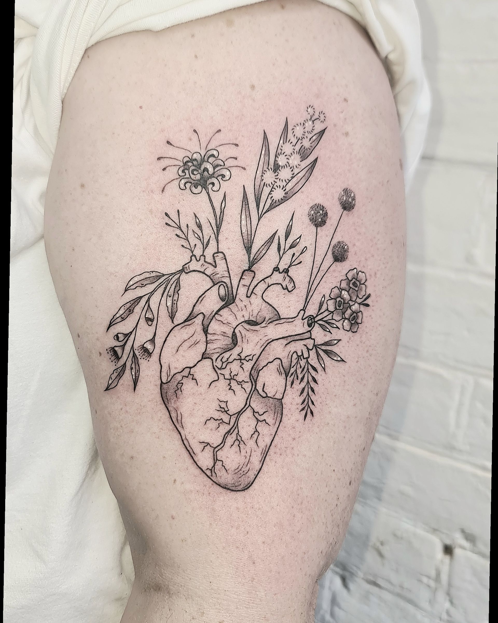 tattoo on left arm