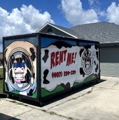 A container with a cow graphic and 