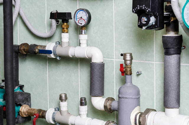 Outdoor plumbing service work.