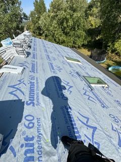 roof being replaced new synthetic underlayment 