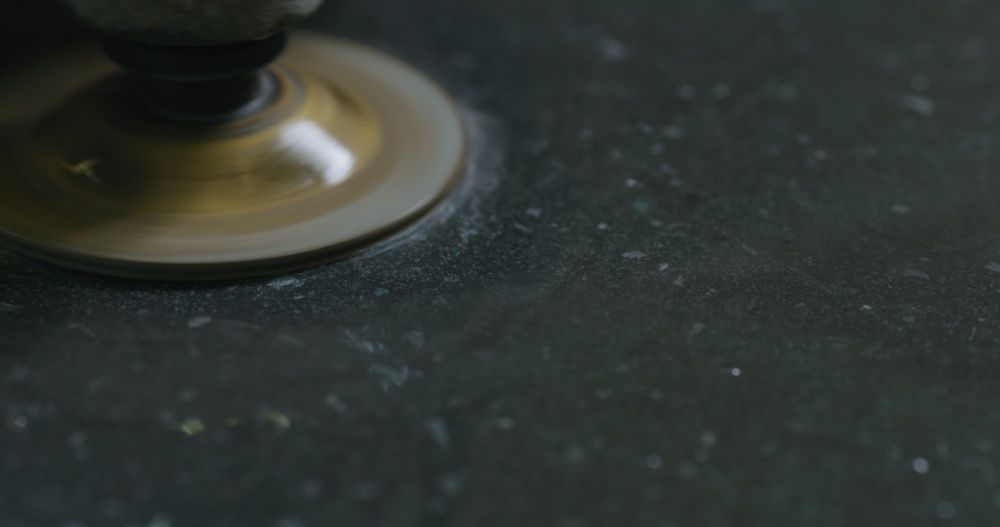 A Close up Of a Sander on A Black Surface — Slippery Solutions In Cranbrook, QLD 