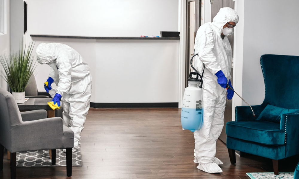 Team sanitizing office environment in South Florida.
