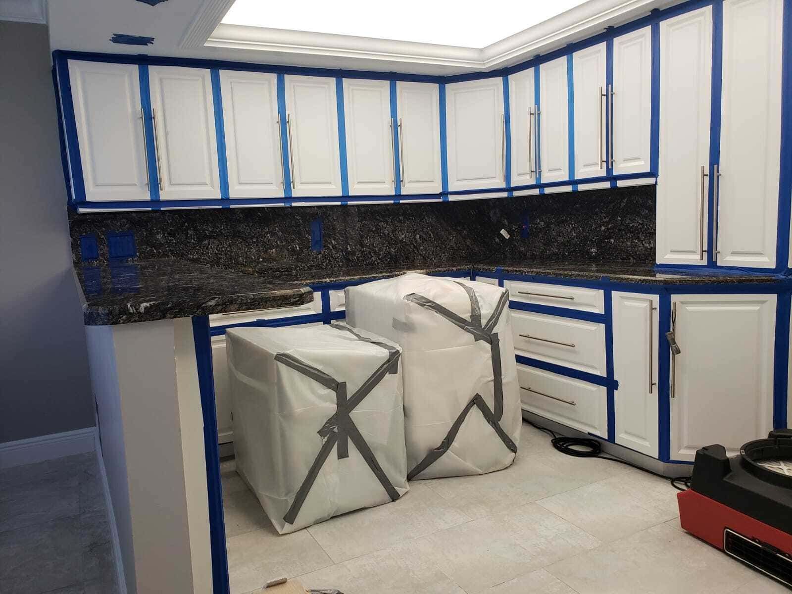 kitchen under water damage restoration process Fort Myers