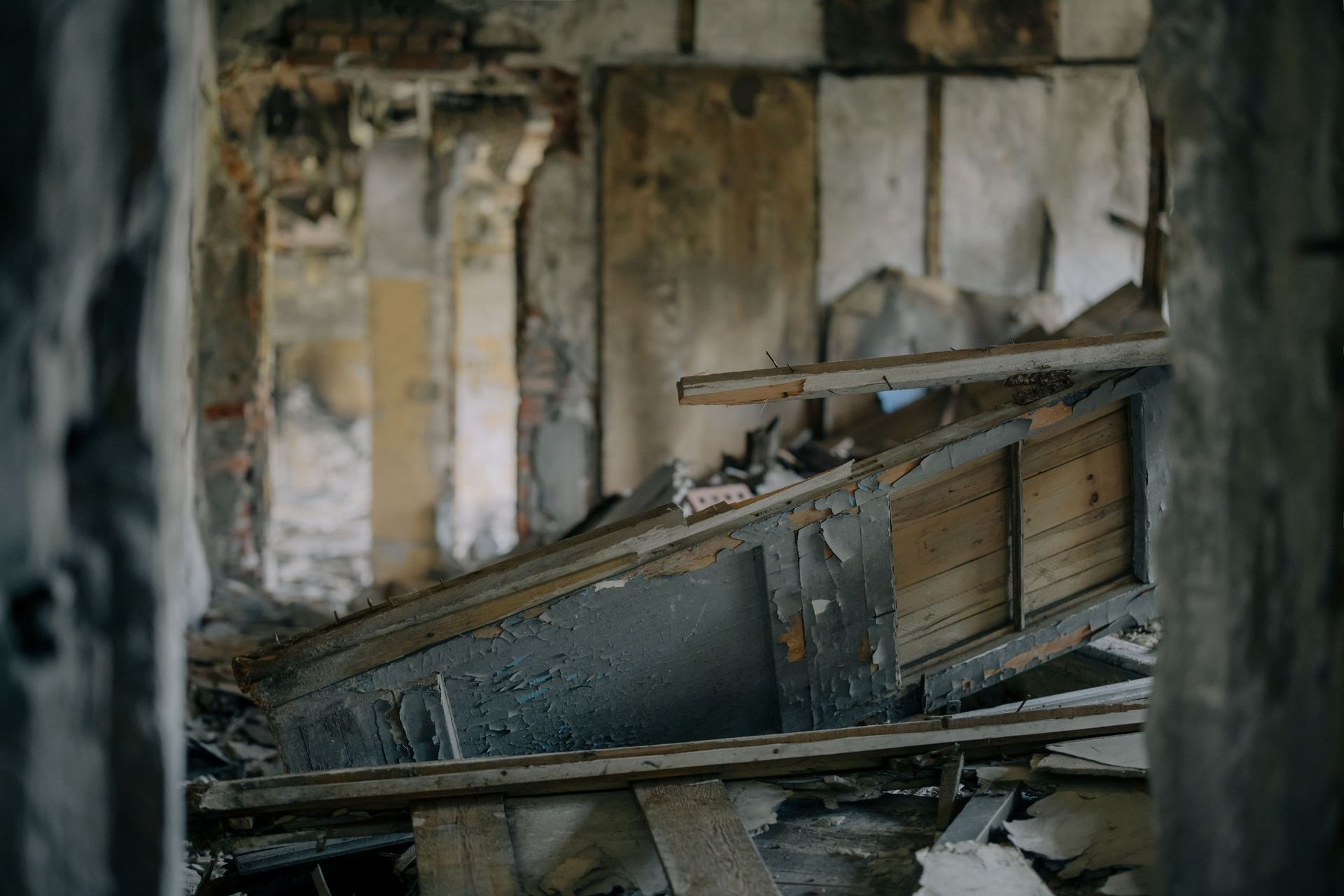 Residential house with visible smoke damage before fire restoration.

