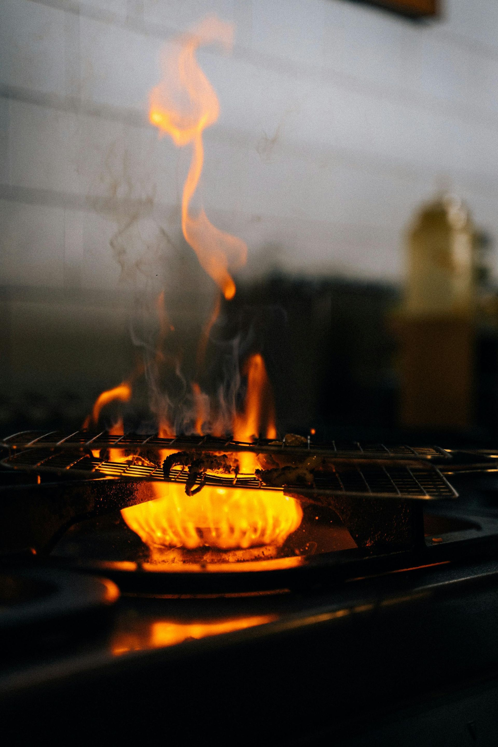 Kitchen fire damage with smoke and soot buildup in a Fort Myers home