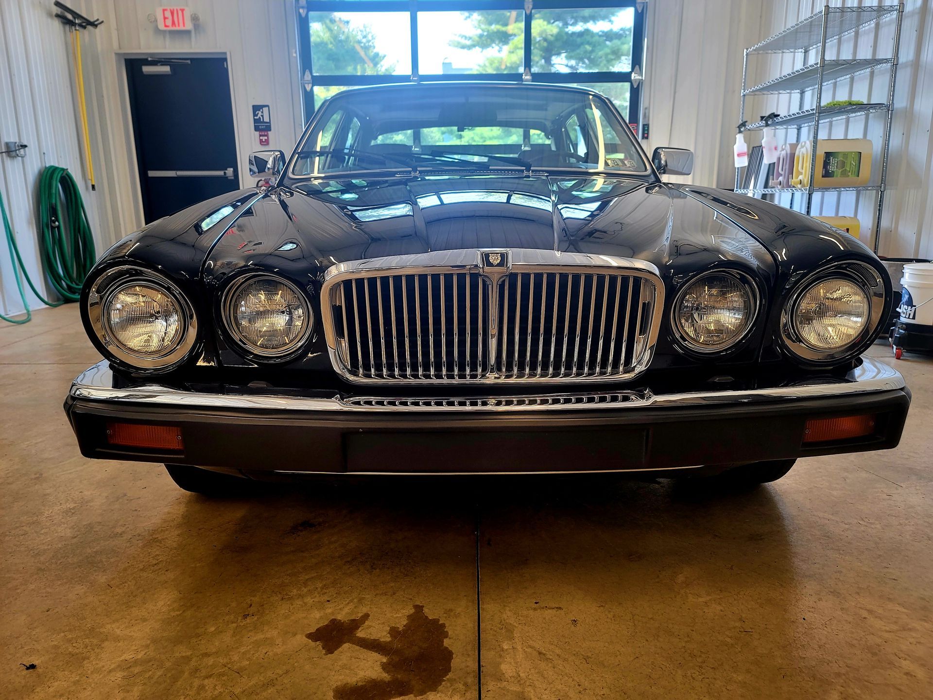 Up close to black car inside of our garage bay in Hummelstown, PA | Crowne Automotive