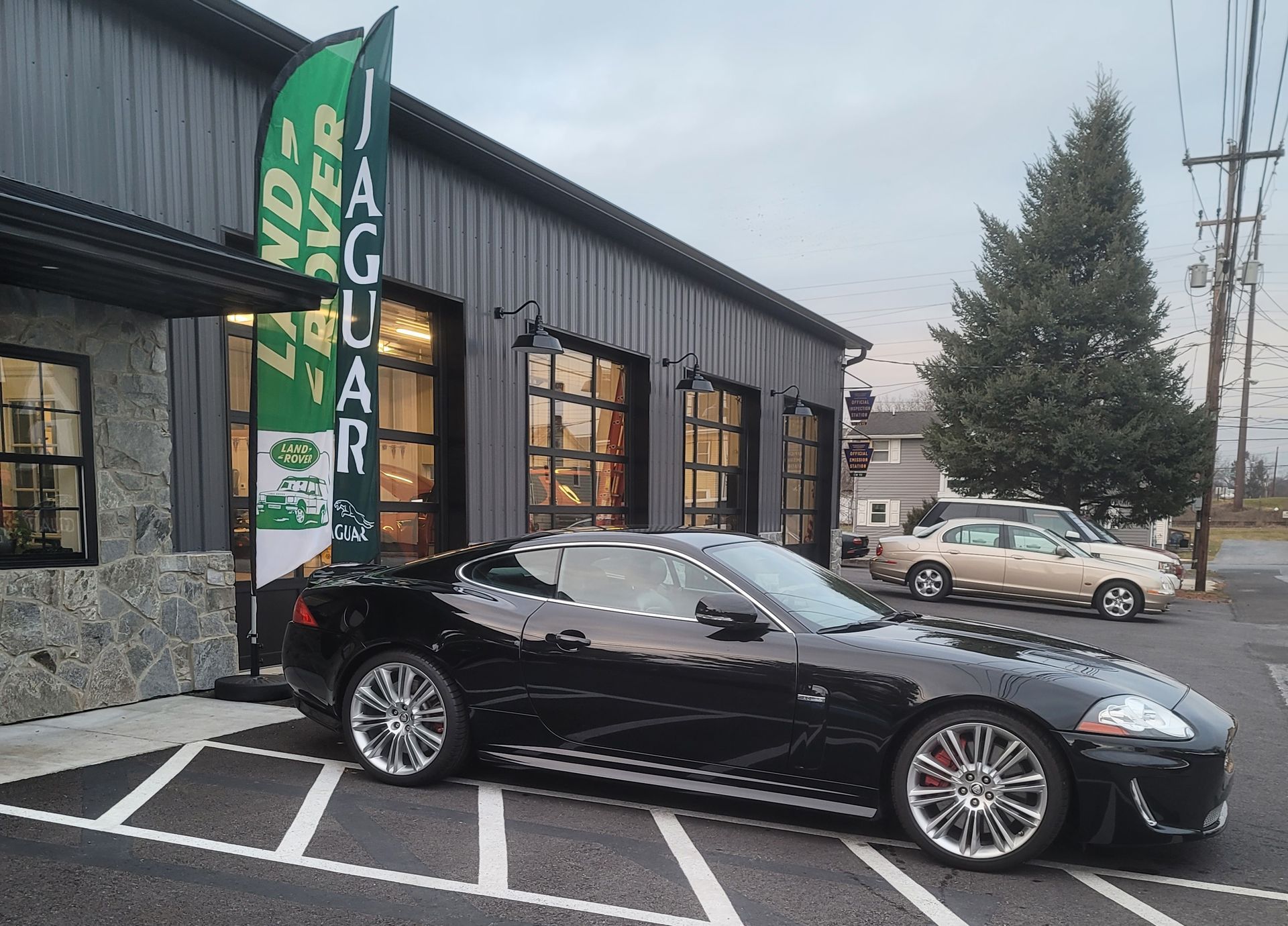 Black car parked outside of our shop in Hummelstown, PA | Crowne Automotive