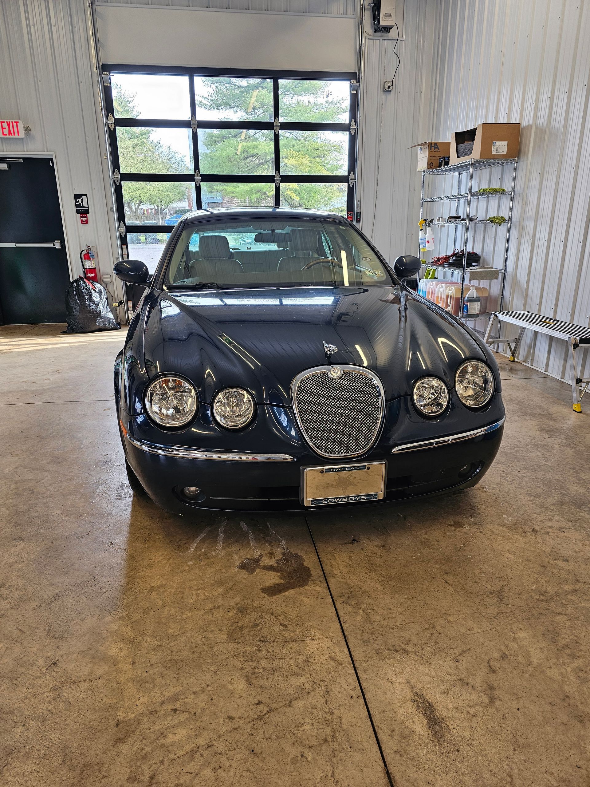 Black car inside of our garage bay in Hummelstown, PA | Crowne Automotive