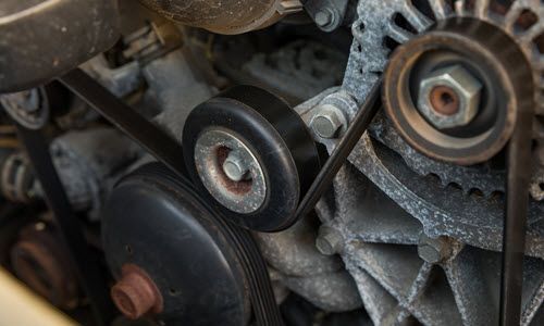 Up close to serpentine belt inside of vehicle | Crowne Automotive