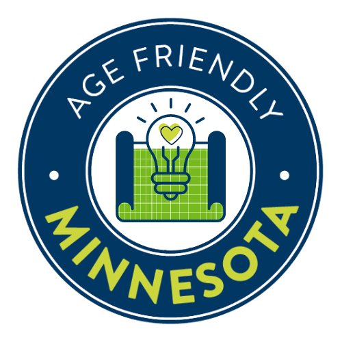 A blue circle with the icon of a hand with a green heart in the center. The words Age-Friendly Minnesota encircle the icon