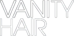 Logo di Vanity Hair in lettere dal contorno sottile su sfondo bianco.