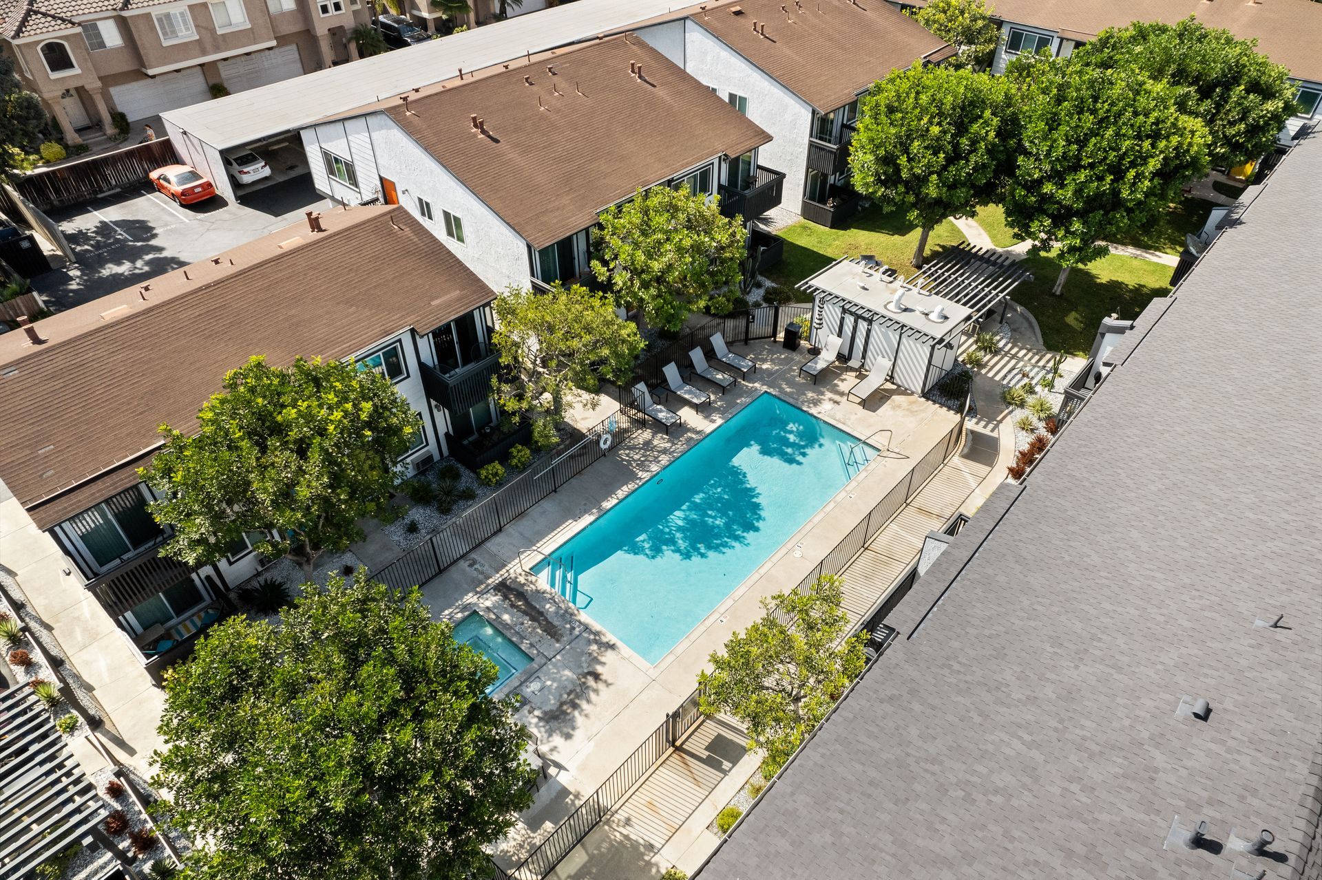 Sliding Photo Gallery Displaying Community Amenities - Overhead view of swimming pool