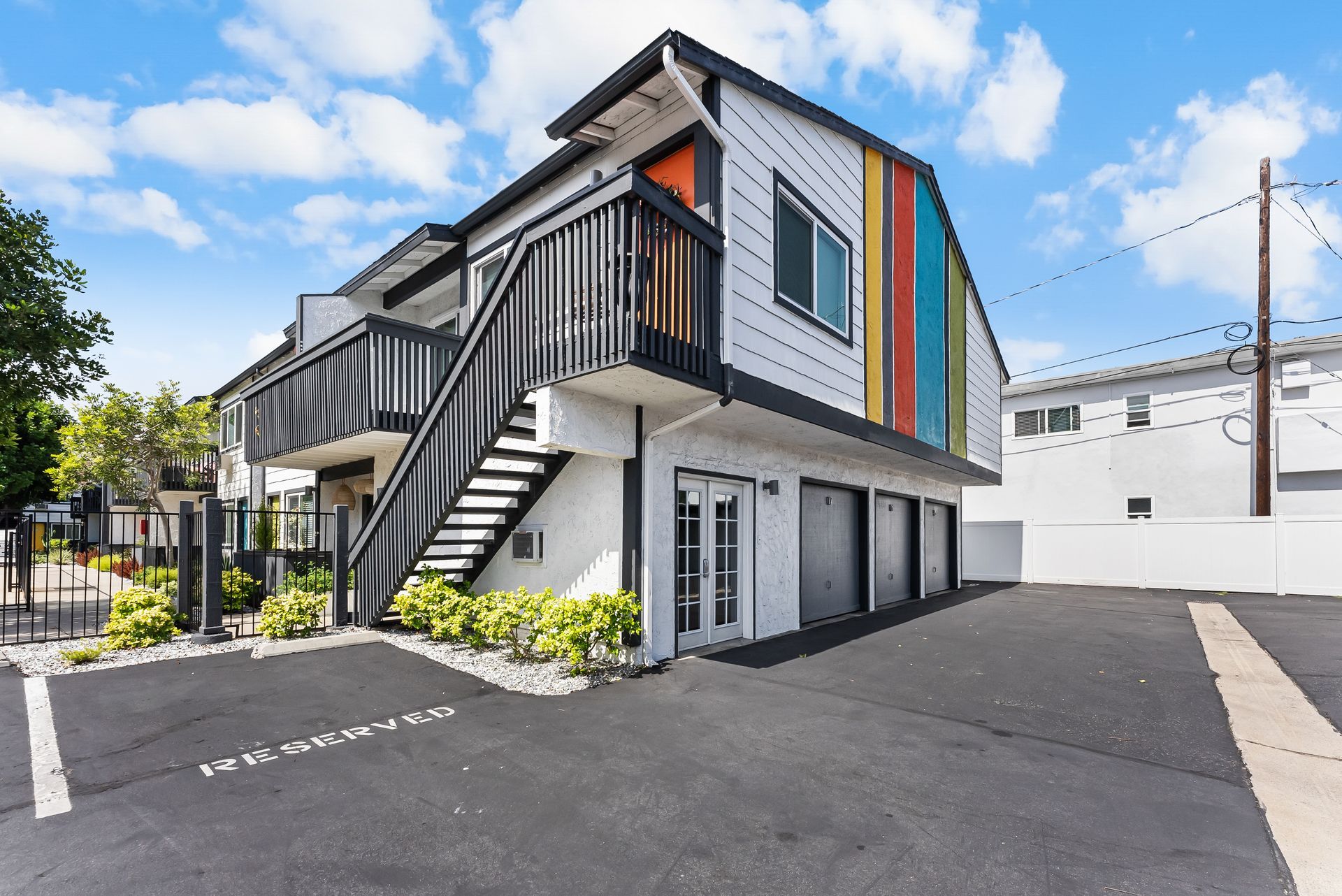 Building exterior with stairs and multi colored wall