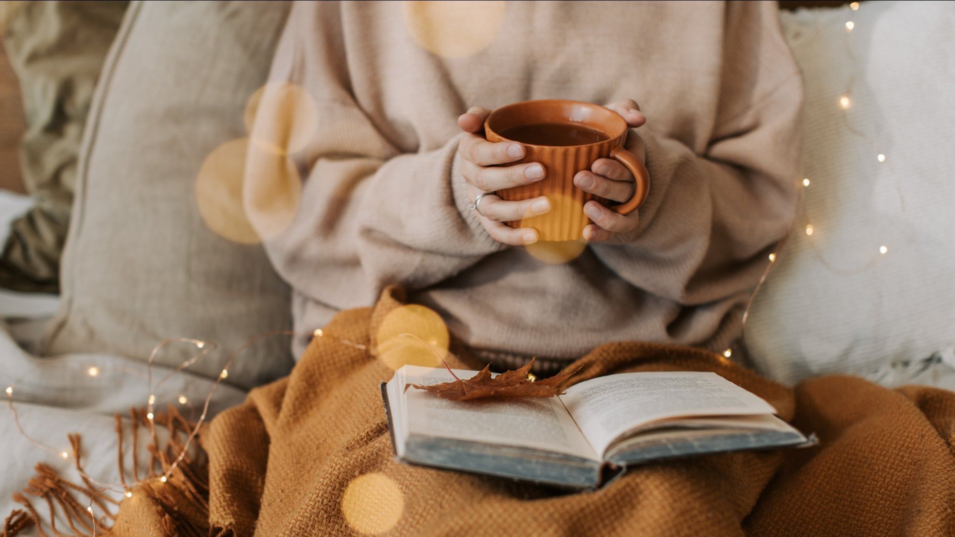 Reading book while sipping coffee