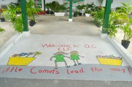 A drawing of two children holding hands with the words little comet 's lead the way
