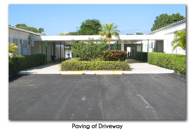 A picture of a driveway with the caption paving of driveway