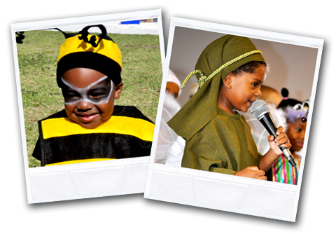 A boy in a bee costume and a girl singing into a microphone