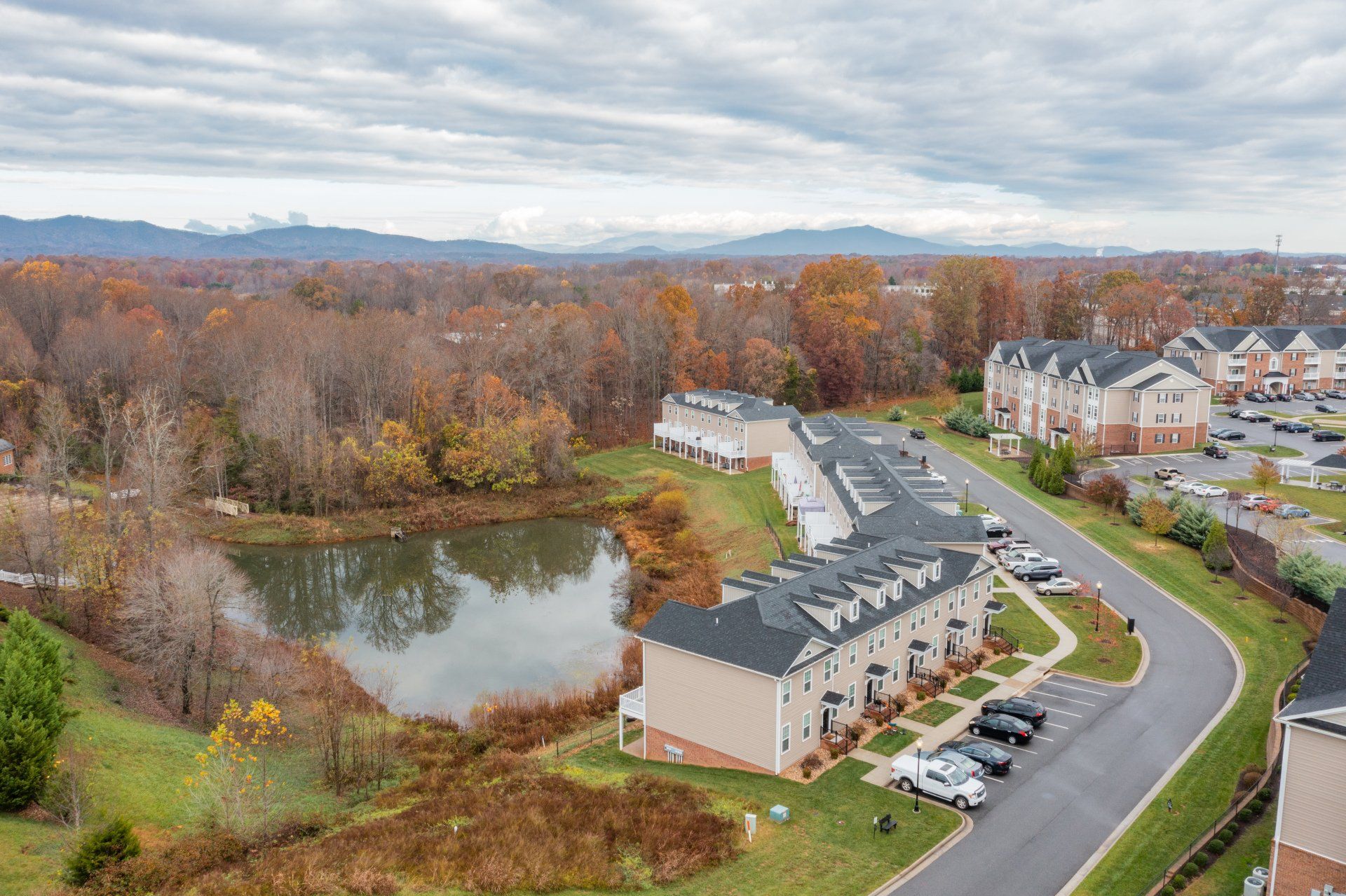 Aerial view of complex with nearby lake