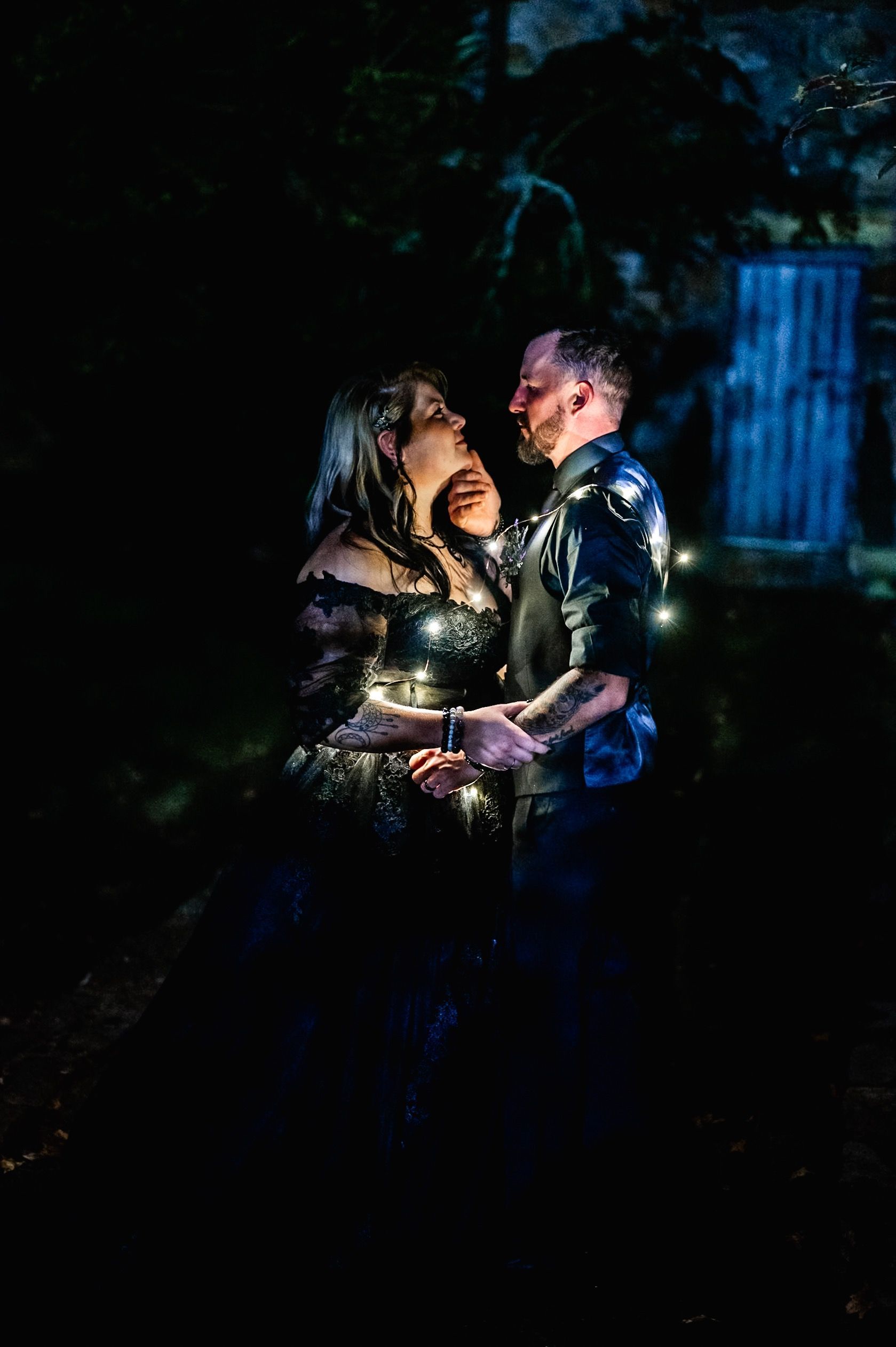 couple's photoshoot at night with twinkle lights