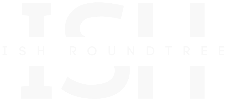 Faint white logo text on a white background, reading “THE SHRODINGER.”