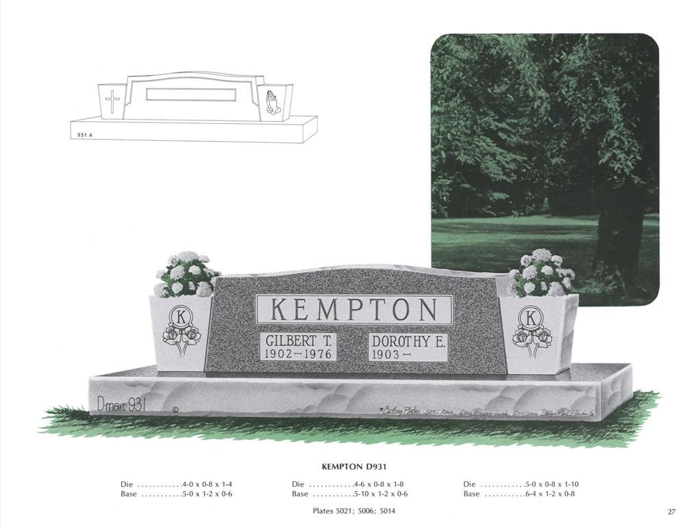 An example of a grey granite double upright monument headstone. Two stone vases are shown on both sides with white flowers in them. Various numbers are below, but are for the companies reference use only.
