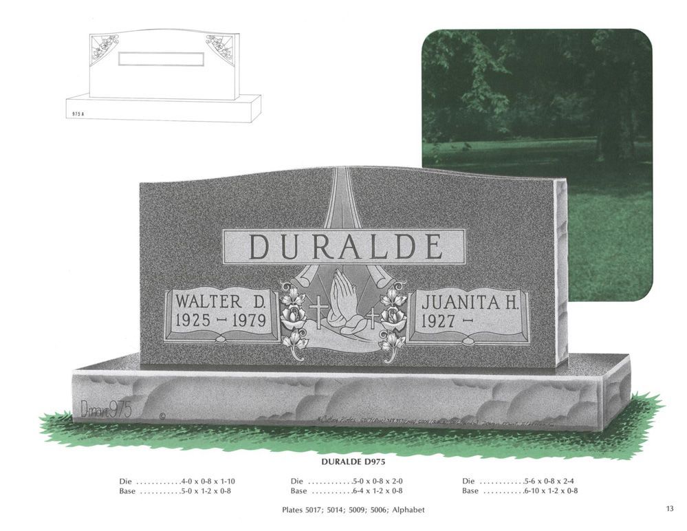 An example of a grey granite double upright monument headstone. It shows a religious carving in the center. Various numbers are below, but are for the companies reference use only.