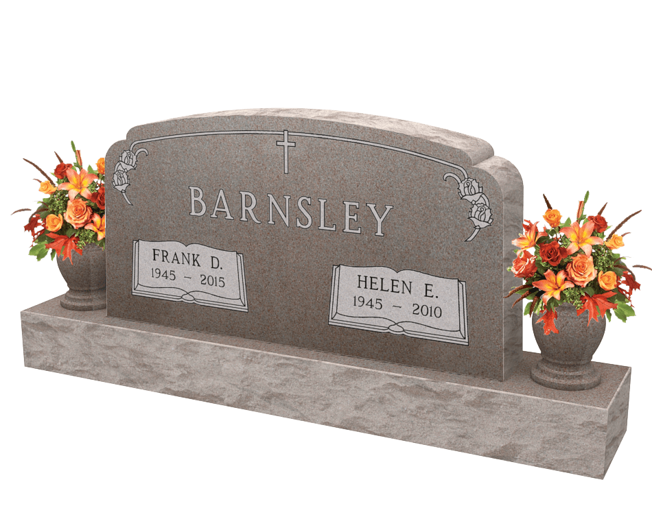 An example of a double upright monument in light brown granite shown with orange and red flowers in vases on both sides.