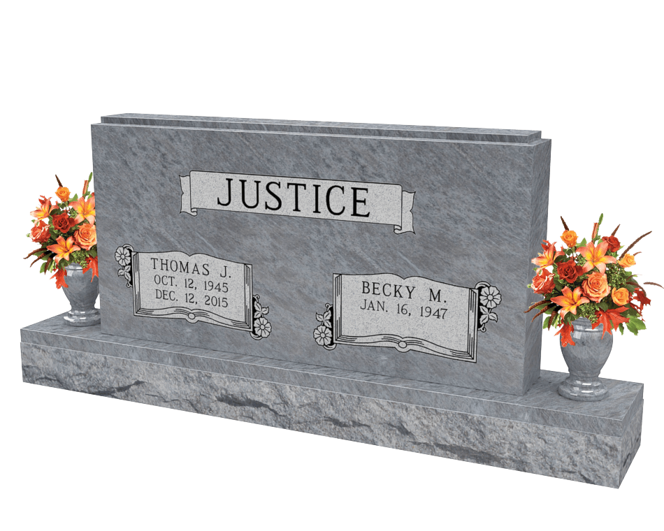 An example of a double upright monument in light grey granite shown with orange and red flowers in vases on both sides.