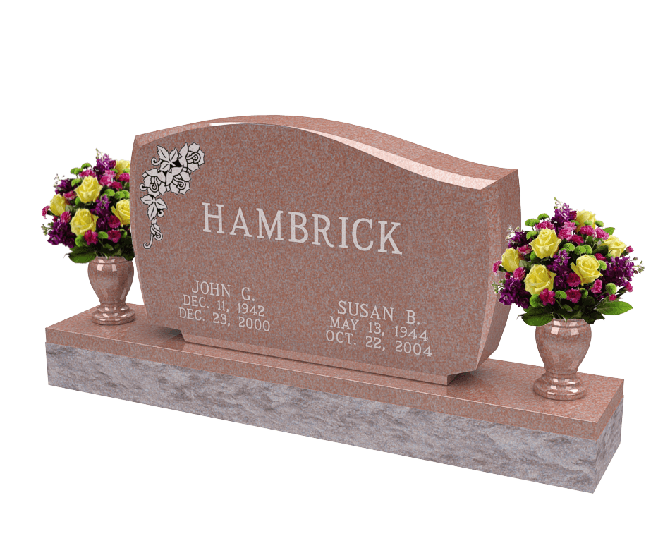 An example of a double upright monument in a pink granite shown with flowers of multiple colors in vases on both sides.