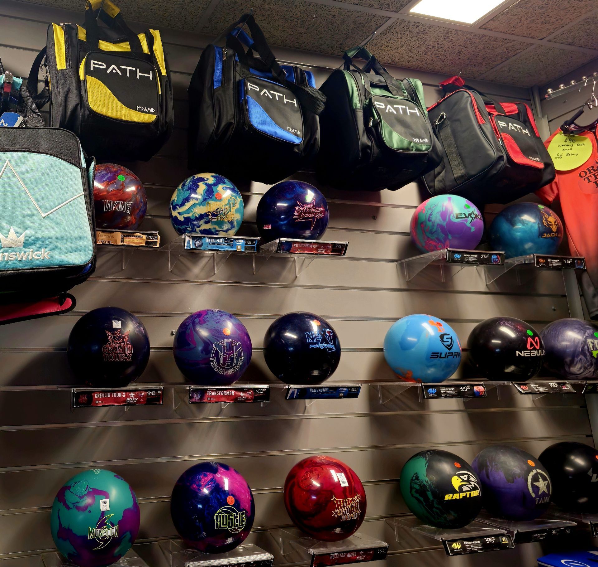 Display of Bowling Balls and Bags on Store Shelves — Orange Tenpin Bowl in Orange, NSW
