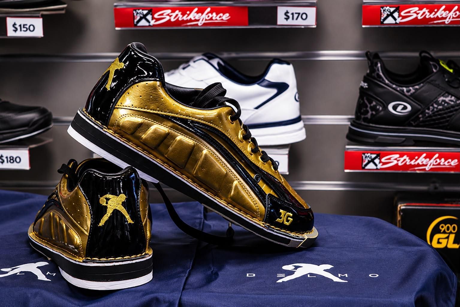 Gold and Black High-top Sneakers Displayed on a Shelf With a Matching Blue Cloth — Orange Tenpin Bowl in Orange, NSW