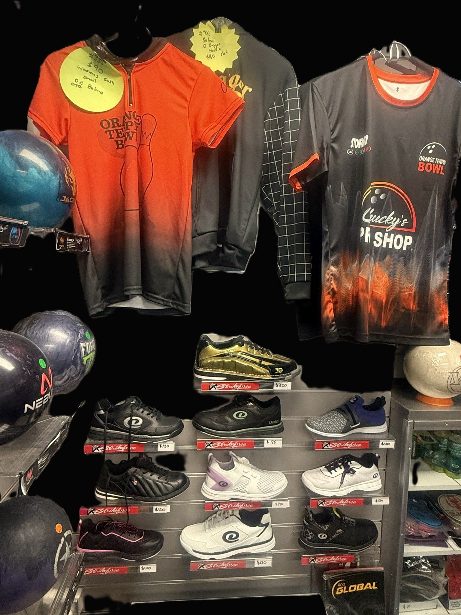 Display of Halloween-themed Sports Apparel, Black and Orange Shirts and Jerseys — Orange Tenpin Bowl in Orange, NSW