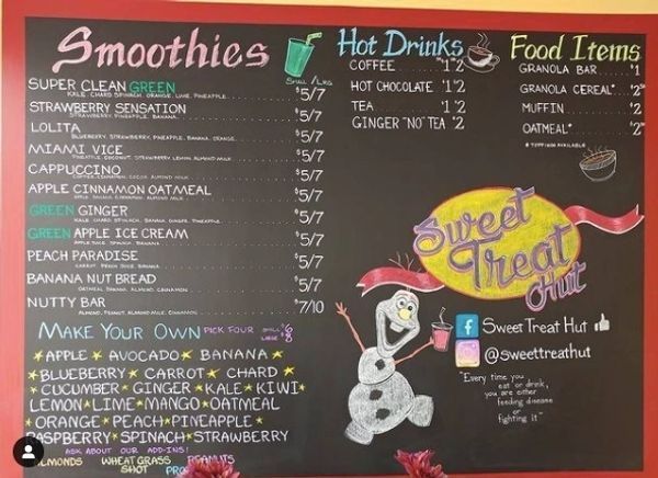 A menu for smoothies hot drinks and food items