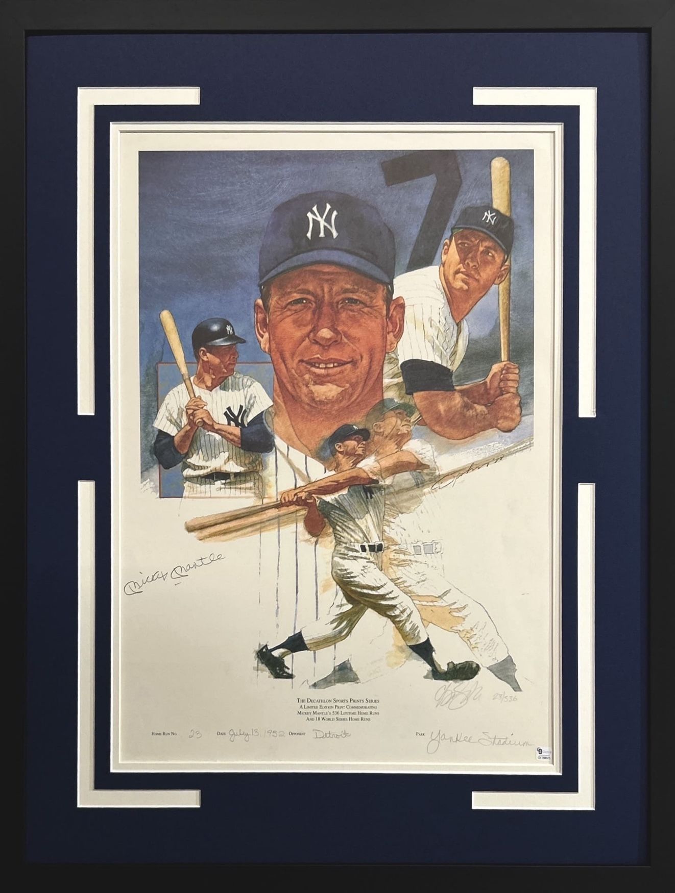 Framed baseball print with New York Yankees imagery and a batter in action on a dark blue mat.