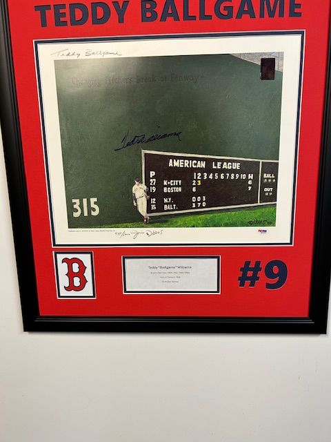 Framed Teddy Ballgame baseball memorabilia in red mat with photo, scorecard, and #9 plaque