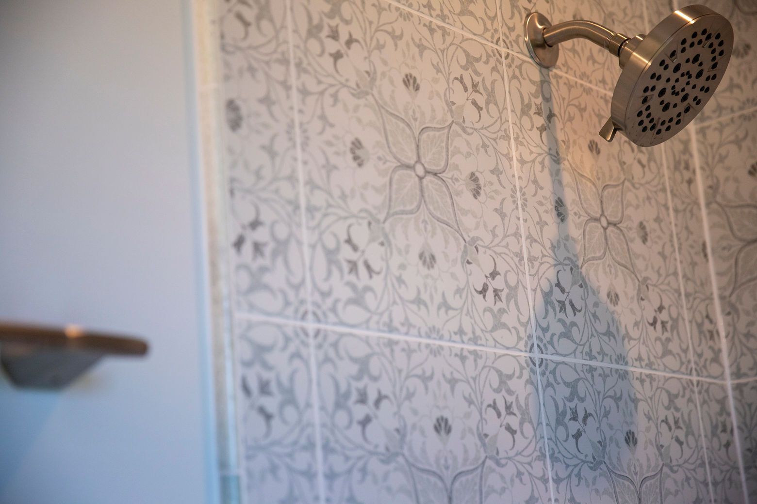 Westminster bathroom with new vanity, countertop, and nickel faucets.