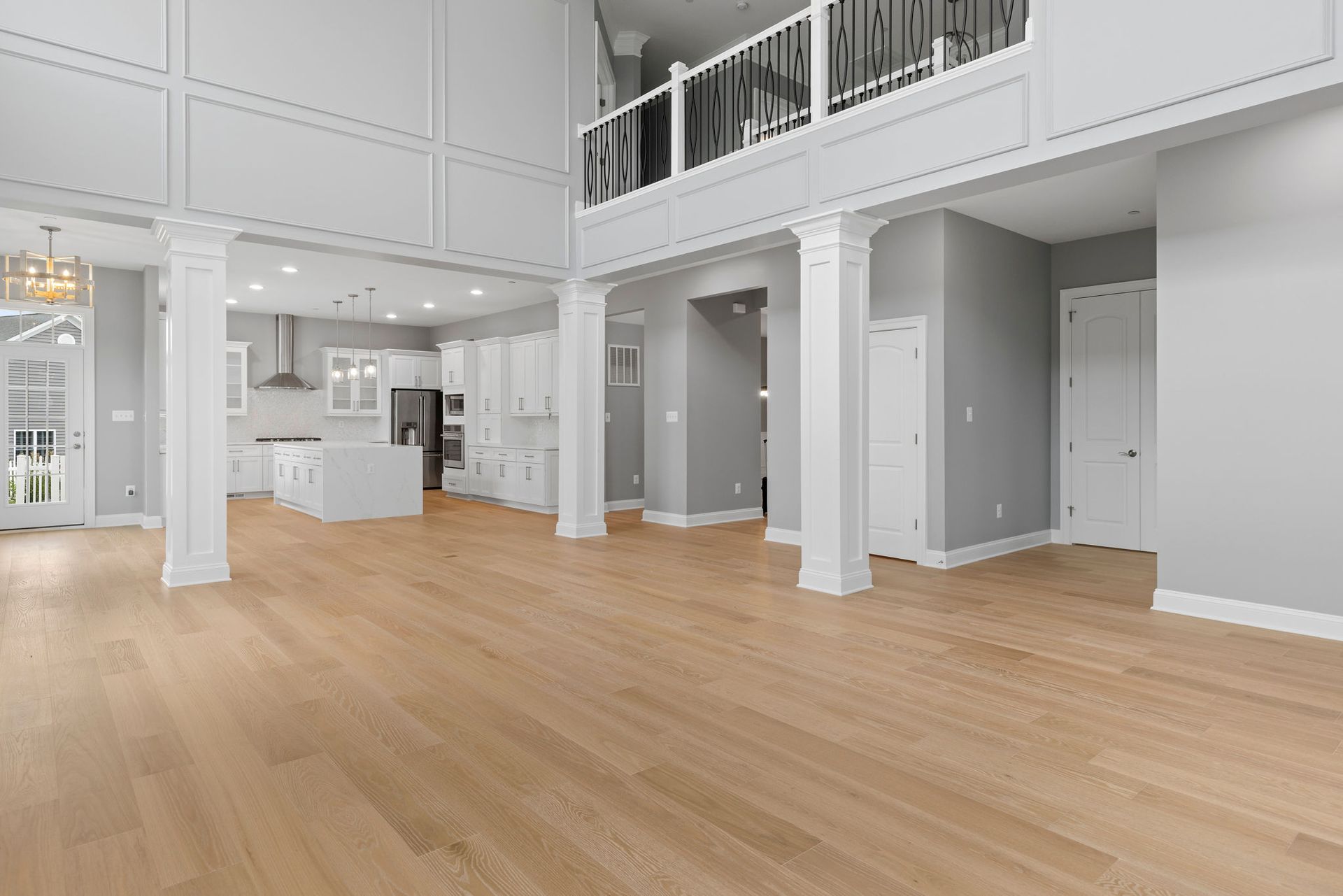 Open-concept floor plan renovation completed by General Contractor in Reisterstown, MD. Structural work and new finishes.