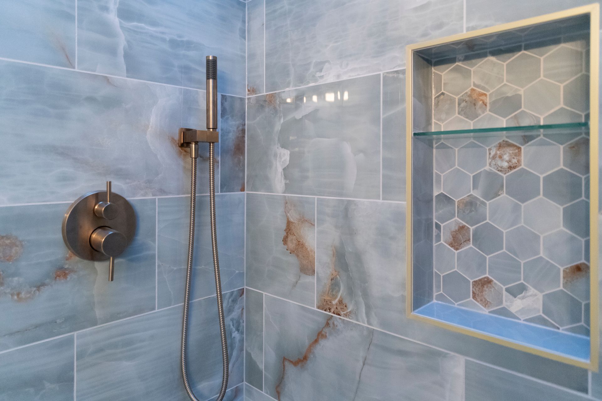 A1 Renovations' signature custom tile work, showcasing straight lines and a professional finish that elevates the entire room.