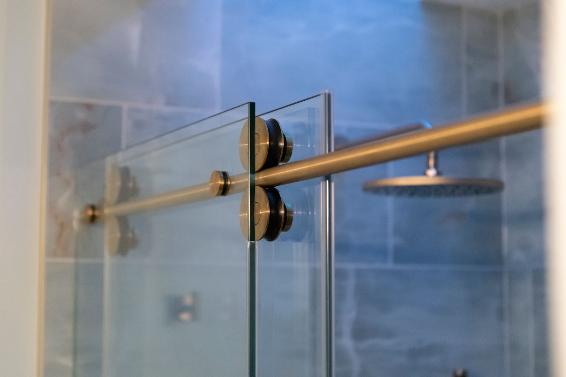 Seamless walk-in shower entry for a modern bathroom remodel.