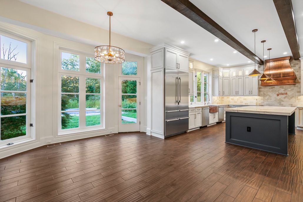 An image of the custom-designed glass-front cabinets, showcasing a tidy arrangement of glassware.