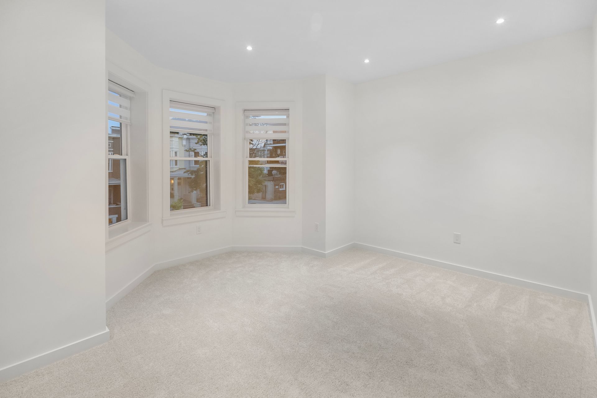 Seamless flooring and custom trim in a newly renovated house.